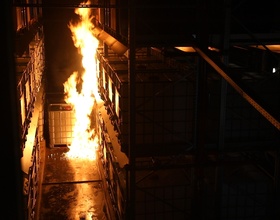 Sprinkler protection system for hazardous goods warehousing facilities