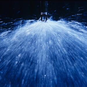 Discharge of the extinguishing water via nozzles